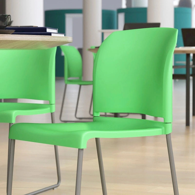 Chaise empilable en plastique multicolore à piètement luge, une place